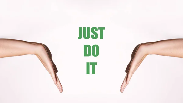 Motivational horizontal poster. Womens hands in a pointing gesture. Green motivating inscription Just Do It — Stock Photo, Image