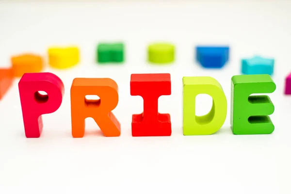 Palabra Orgullo Letras Bloques Colores Con Formas Arco Iris Colores —  Fotos de Stock