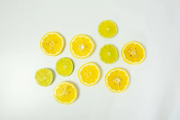 Fresh Organic Simple Green Lime Yellow Lemon Slice White Background — Fotografia de Stock