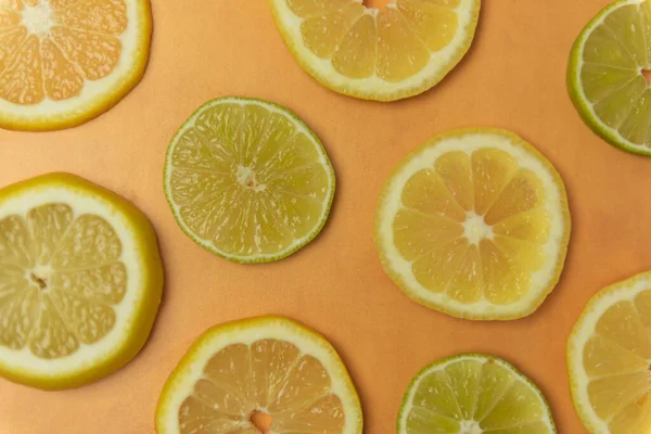 Fresh Organic Simple Green Lime Yellow Lemon Slice Orange Terracotta — Stock Photo, Image