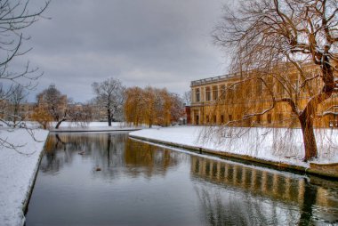 Winter in Cambridge with snow on banks of the University of Cambridge. Gloomy winters day. High quality photo