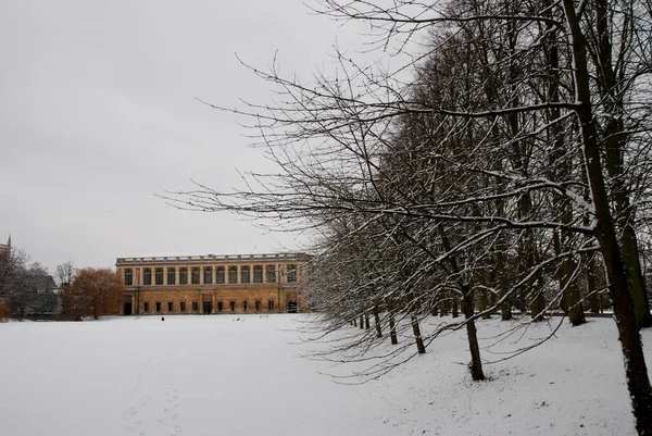 Winter in Cambridge with snow on banks of the University of Cambridge. Gloomy winters day. High quality photo
