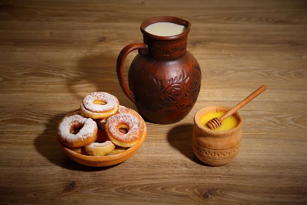 homemade donuts with milk and honey