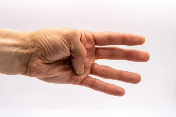 hand with four fingers out of man on white background in light box