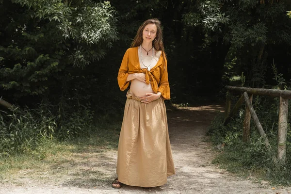 Pregnant Woman Looking Camera While Standing Path Summer Forest — Fotografia de Stock