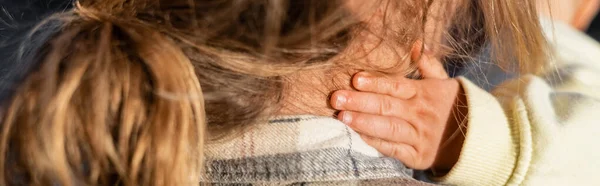 Cropped view of baby girl touching dad outdoors, banner — Stock Photo