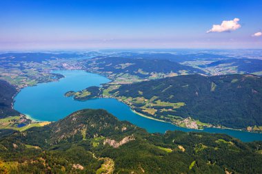 Amazing view from Schafberg by St. Sankt Wolfgang im in Salzkammergut, Haus house Schafbergspitze, lake Mondsee, Moonlake. Blue sky, alps mountains. Upper Austria, Salzburg, near Wolfgangsee, Attersee