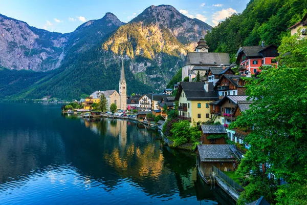 Scenic picture-postcard view of famous Hallstatt mountain village in the Austrian Alps, Salzkammergut region, Hallstatt, Austria. Hallstatt village on Hallstatter lake in Austrian Alps.
