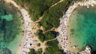 Porto Timoni is an amazing beautiful double beach in Corfu, Greece. Porto Timoni beach at Afionas is a paradise double beach with crystal clear azure water in Corfu, Ionian island, Greece, Europe
