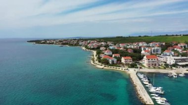 Petrcane village tourist destination coastline aerial panoramic view, Dalmatia region of Croatia. Aerial top view of village Petrcane, Croatia. Petrcane aerial view, Dalmatia region of Croatia