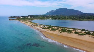 Aerial drone view of Halikounas Beach and Lake Korission, Corfu island, Ionian Sea, Greece. Halikounas Beach, Corfu Island. View of the deserted, sandy, windy beach on the western part of Corfu.