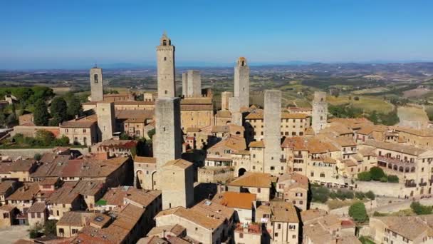 サンジミニャーノの町 トスカーナ州 その有名な中世の塔とイタリア ユネスコの世界遺産に登録されている中世の村サン ジミニニャーノの空中写真 イタリア トスカーナ州 ヴァル デルサ — ストック動画