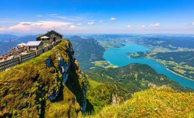 Amazing view from Schafberg by St. Sankt Wolfgang im in Salzkammergut, Haus house Schafbergspitze, lake Mondsee, Moonlake. Blue sky, alps mountains. Upper Austria, Salzburg, near Wolfgangsee, Attersee