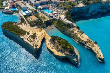 Famous Canal D'amour in Sidari, Corfu island, Greece. Famous Canal d'Amour beach with beautiful rocky coastline in amazing blue Ionian Sea in Sidari holiday village on Corfu island in Greece.