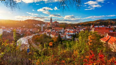 View of historical centre of Cesky Krumlov town on Vltava riverbank on autumn day overlooking medieval Castle, Czech Republic. View of old town of Cesky Krumlov, South Bohemia, Czech Republic.