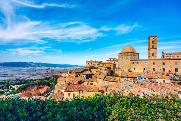 Tuscany, Volterra town skyline, church and panorama view. Maremma, Italy, Europe. Panoramic view of Volterra, medieval Tuscan town with old houses, towers and churches, Volterra, Tuscany, Italy.