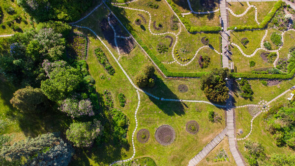 Walking paths on the territory of the botanical garden in Tomsk, the city of Russia
