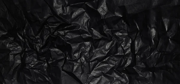 Close-up of crumpled black paper