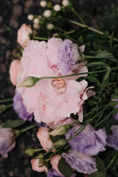 Beautiful wedding collage with wedding flowers and rings