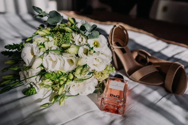 Beautiful wedding collage with wedding flowers and rings