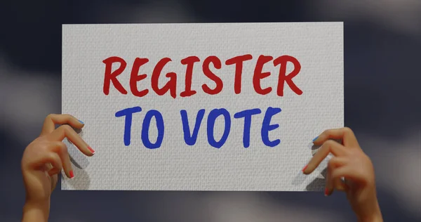 CGI hands showing placard, Register To Vote. 3D render.