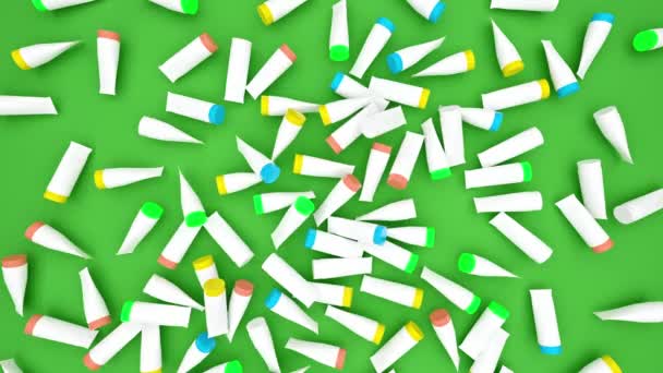 Scattered Colorful Plastic Tubes Green Surface Wiped Create Space Text — Vídeos de Stock