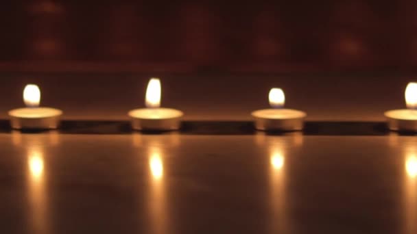 Tealight Candles Dark Camera Sliding One End Another — Videoclip de stoc