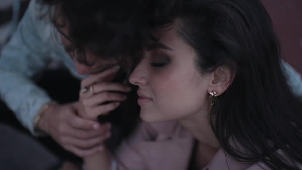 Couple gently sitting outdoors close-up — Stock Video