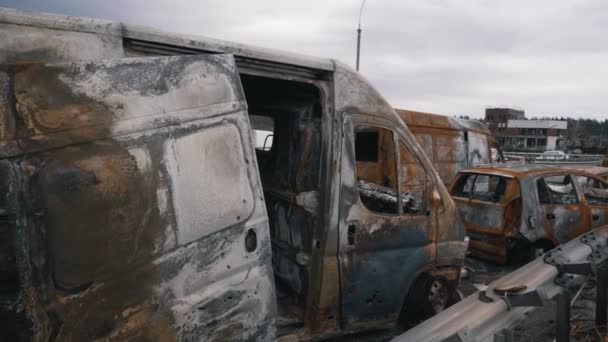 Burnt civilian car on the bridge Stock Footage