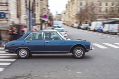 french car in the street. Peugeot 504 clipart
