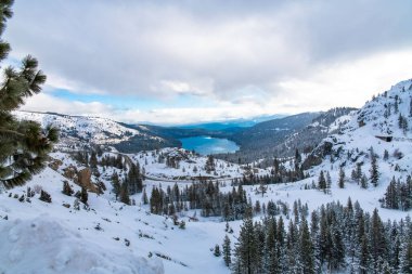 The Donner lake under the snow in winter, in the Nevada clipart