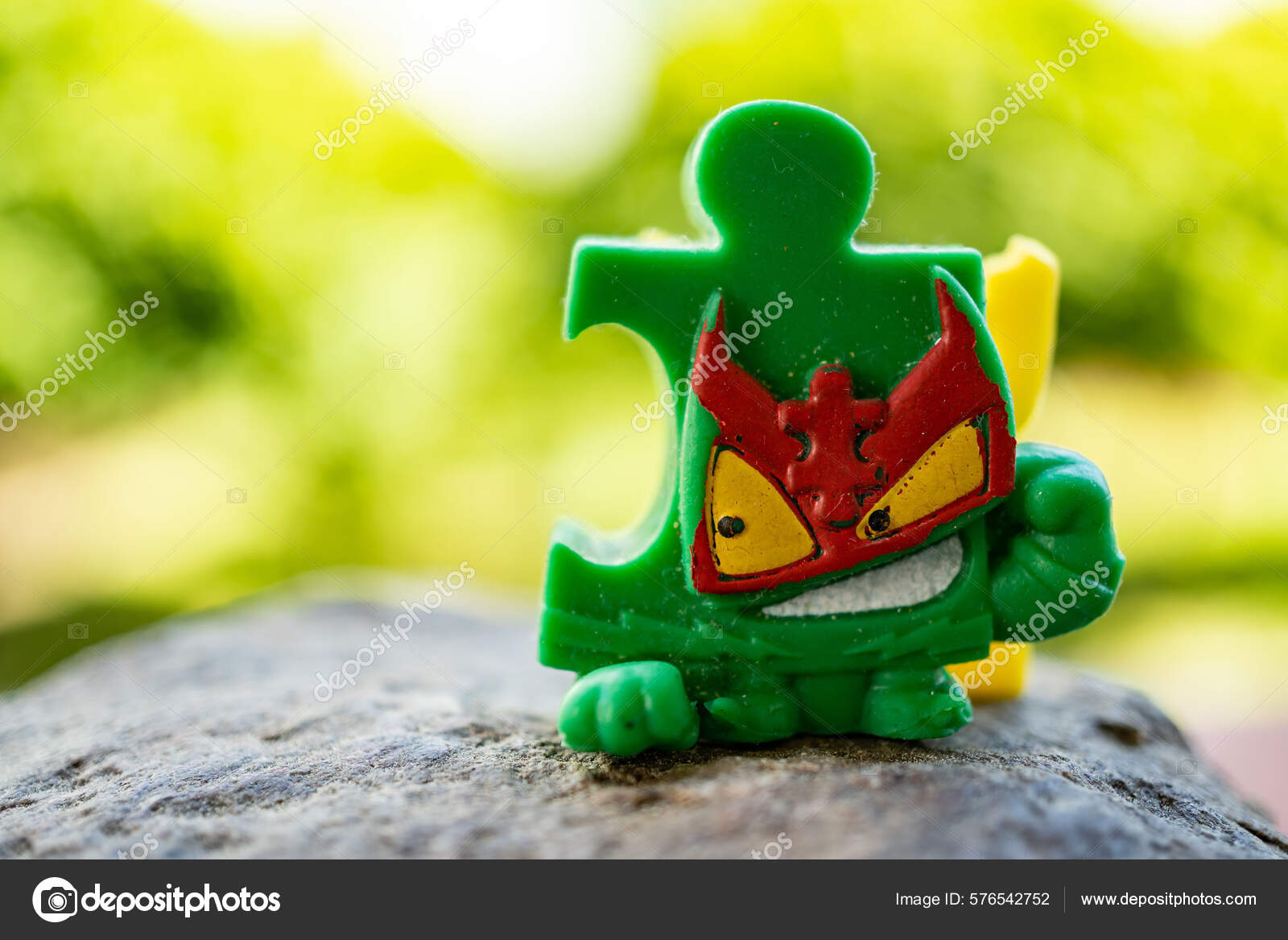 Closeup Superthings Green Puzzle Shaped Toy Figurine Villain Team Rock –  Stock Editorial Photo © wirestock_creators #576542752