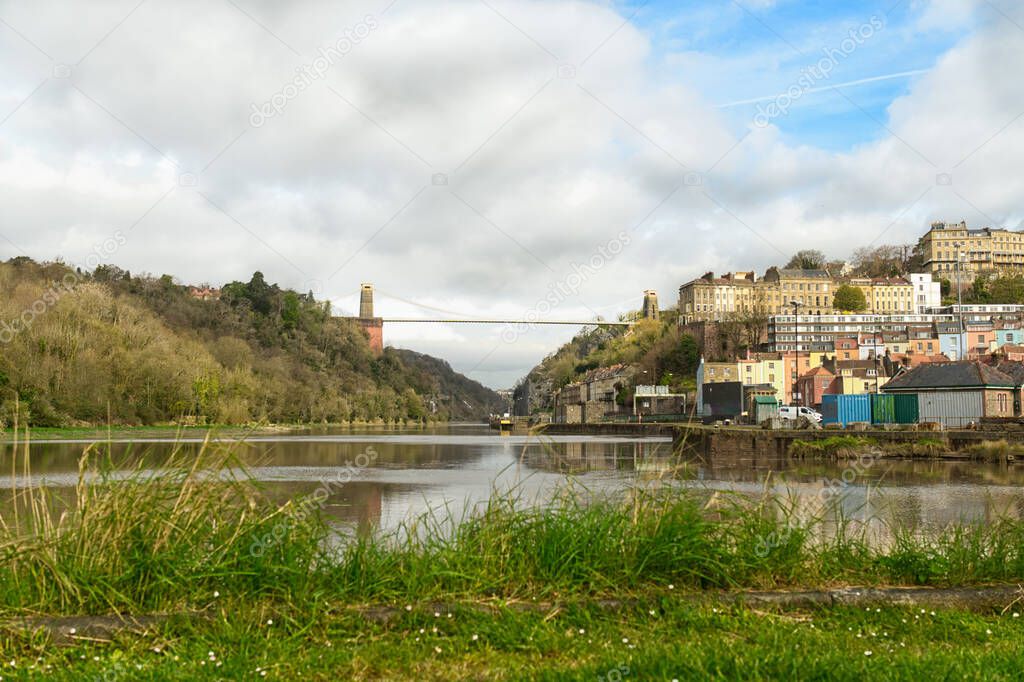 An extreme wide of Clifton Suspension Bridge with Leigh Woods on the left and Clifton on the right by the River Avon