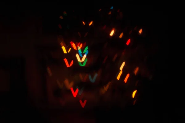Koyu Arkaplanda Renkli Işıkların Yakın Plan Çekimi — Stok fotoğraf