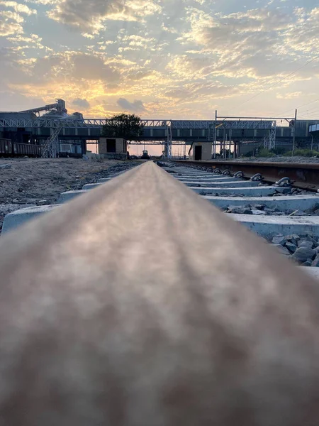 Vertical Shot Train Rail Leading Distance Cloudy Sunset Sky — Stock Photo, Image
