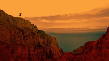 Gün batımında okyanusa atlayan bir adam.