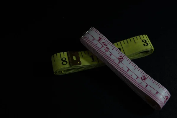 Two Measuring Dark Bacground — Stock Photo, Image