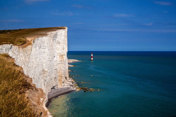 White cliffs and an old lighthouse in the southern England, United Kingdom