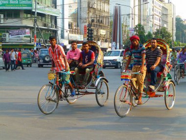 colorful and chaotic street scenes with thousands of rickshaws in Bangladesh is making a very exotic and oriental atmosphere clipart