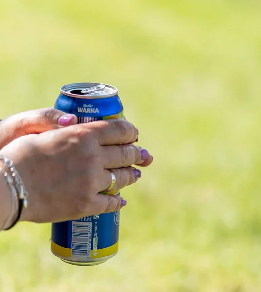 Selective Focus Shot Female Hands Holding Warka Brand Beer Can — Stock Photo, Image