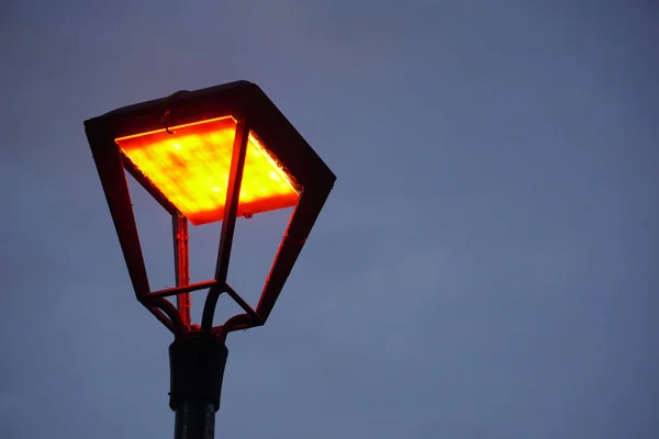 Closeup Top Illuminated Street Lamp Blue Sky Background — Stock Photo, Image