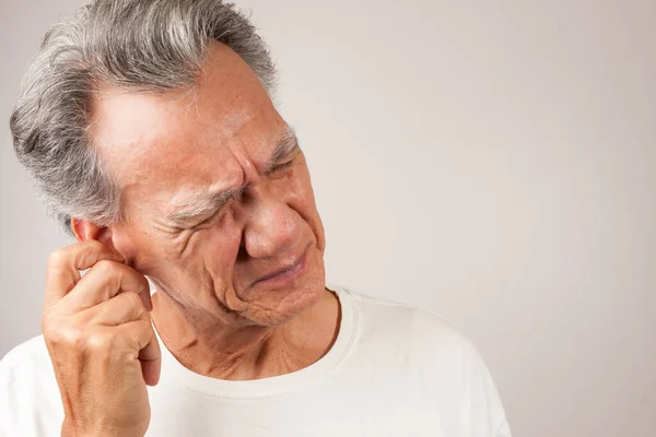 Mature Man Shaking His Ear Trying Get Water Out — Stock Photo, Image
