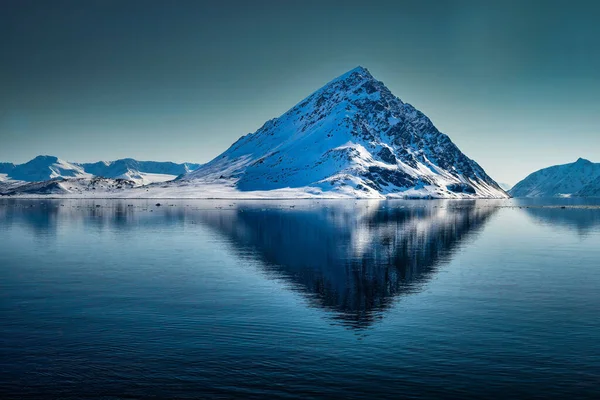 Arctic One Shaped Mountain Snow Exposed Rock Its Reflection Water — Stock Photo, Image