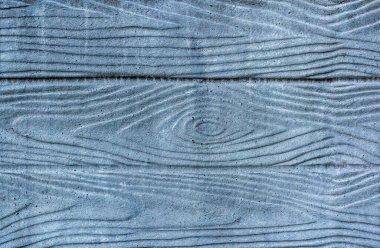 Beton yüzey gri ahşabı taklit ediyor. Doku veya arkaplan