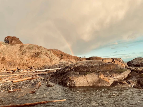 Landscape Small Puddle Next Rock Formations Background Rainbow Cloudy Sky — Stock Photo, Image