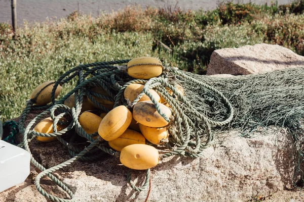 Closeup Fishing Nets Float Lines Stone Sunlight — Stock Photo, Image