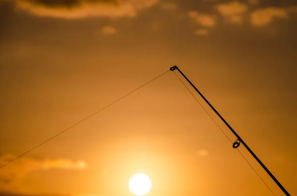 Pescador Pesca Rod Silhueta Pôr Sol Laranja — Fotografia de Stock