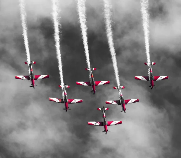 Selective Color Shot Red Planes Formation Black White Sky Clouds — Stock Photo, Image