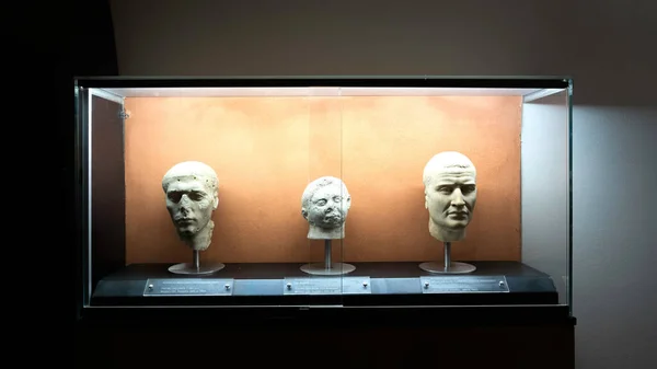 stock image Benevento, Italy Three Stone Heads from Tomb