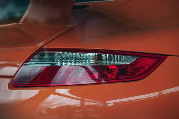 Primer Plano Faro Coche Deportivo Naranja Moderno — Foto de Stock